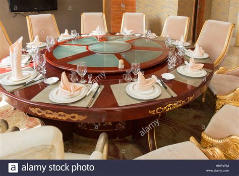 Place settings at Chinese restaurant dinner table, Wuzhong, Ningxia province, China Stock Photo ...