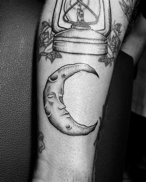 Sleeping moon tattoo on the calf - Tattoogrid.net