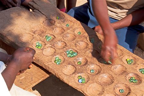 Mancala in African Village | Mancala games are among those a… | Flickr