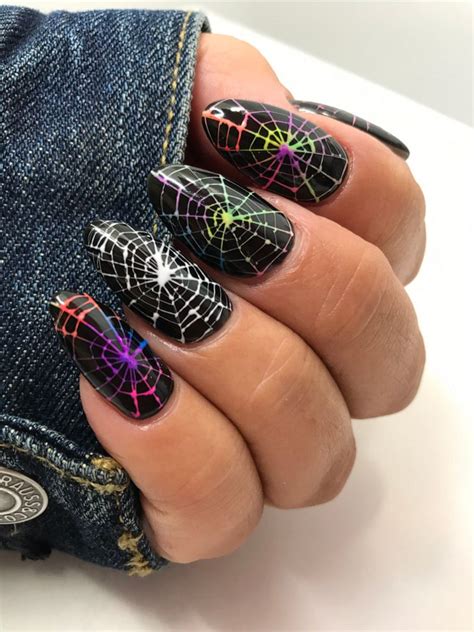 Spider web nail art: Here's how to get the look this Halloween - ABC News