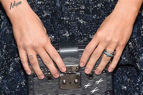 Riley Keough Wants to Laser Off Her Finger Tattoos — but Instead Covers Them with Her Rings