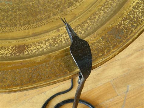 Wrought Iron Serpents Table with Hand Tooled Star Pattern on Brass Top For Sale at 1stDibs