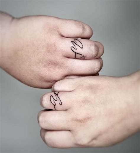 Share 78+ letter tattoo on ring finger super hot - in.coedo.com.vn