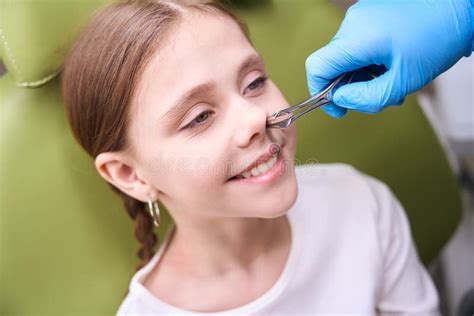 Doctor Otolaryngologist in Protective Gloves Examines the Childs Nose Stock Image - Image of ...