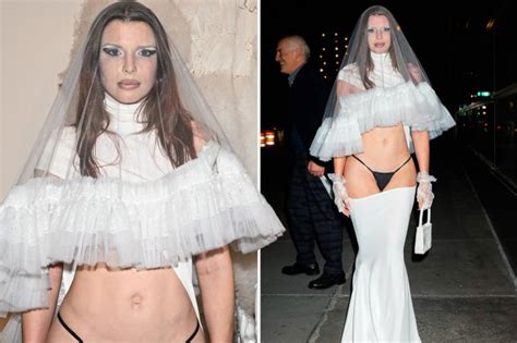 Julia Fox wears just a black thong, wedding veil and train to swanky Sotheby's event in New York ...