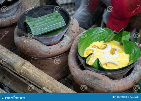 The Art of Making Delicious Bibingka Stock Image - Image of coal, cake ...