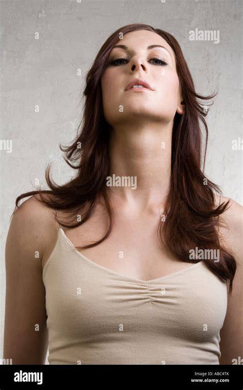 low angle portrait of arrogant young woman Stock Photo - Alamy