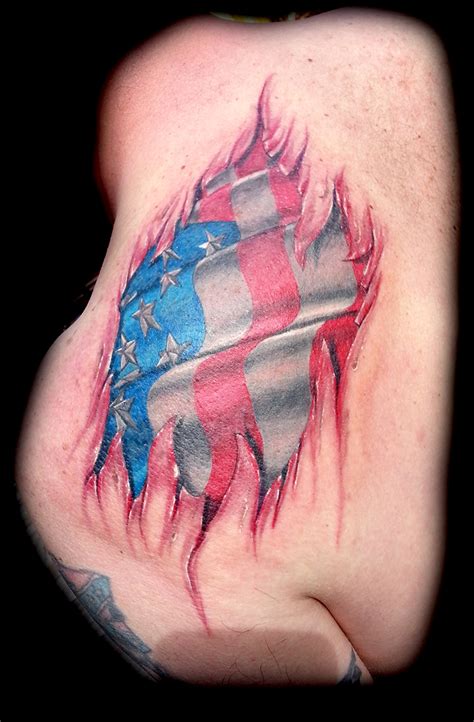 realistic flag tattoo done at Masterpiece Tattoo in San Francisco