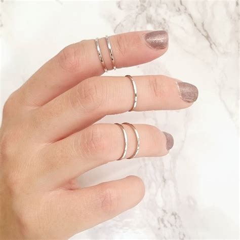 minimalist silver midi rings set of five by staxx | notonthehighstreet.com