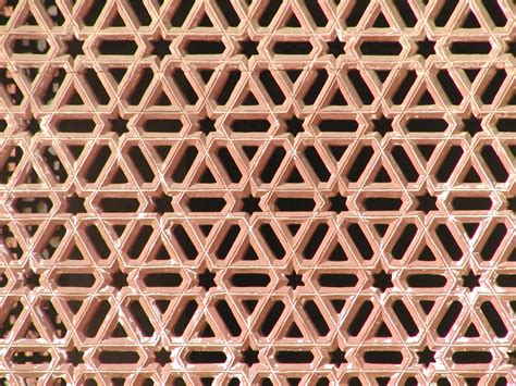 File:Red sandstone Lattice piercework, Qutb Minar complex.jpg - Wikimedia Commons