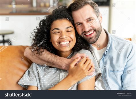 Lovely Multiracial Couple Embraces Cozy Living Stock Photo 1911364258 | Shutterstock