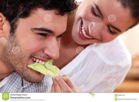 A couple sharing food. stock image. Image of lifestyle - 35387379