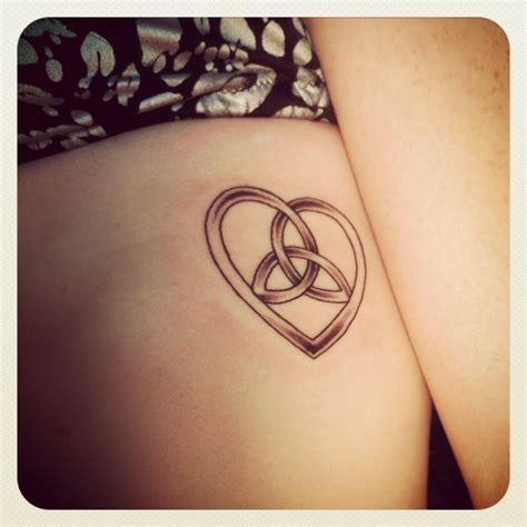 Ripped skin celtic knot tattoo with heart - Google Search | Knot tattoo ...