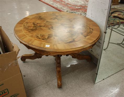 Lot - ROUND BURL COFFEE TABLE