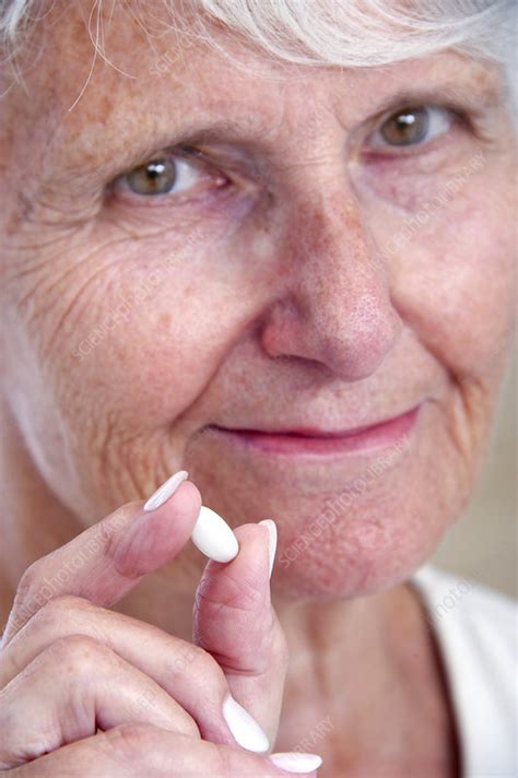 Elderly woman with medication - Stock Image - C025/3206 - Science Photo ...