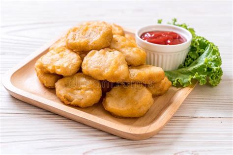 Chicken nuggets with sauce stock photo. Image of white - 128194258