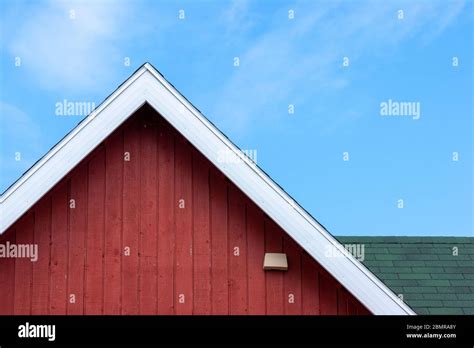Fisherman's shack graphism. Red-painted siding and green roof shingles. White gable fascia ...
