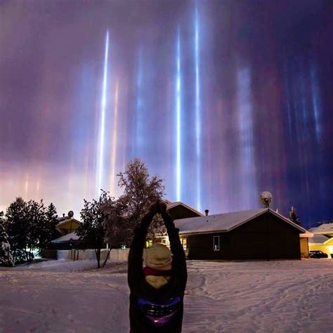 Rare Cold Weather Phenomenon Displays Mesmerizing Light Pillars in the Sky