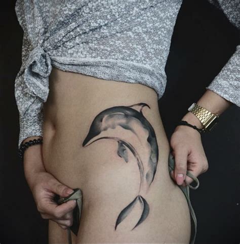 Dolphin Tattoo Meaning: history, photos, sketches and facts about drawing