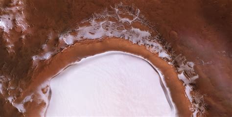 Giant Martian crater filled with ice and snow captured in festive holiday photos