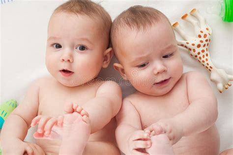 Pretty twins stock image. Image of playing, cute, lovely - 12787767