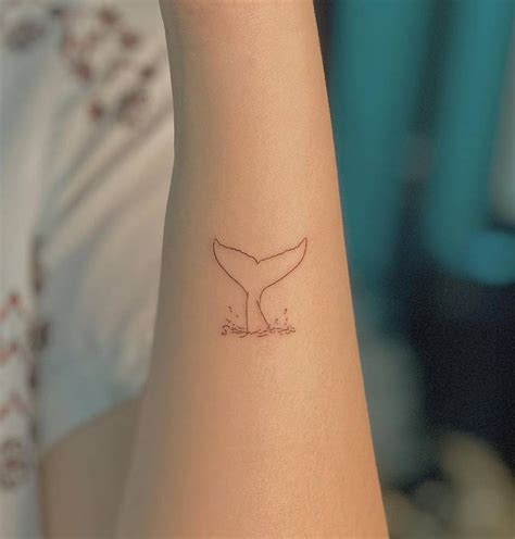 Fine line whale tail tattoo on the forearm | Mermaid tattoos, Whale ...