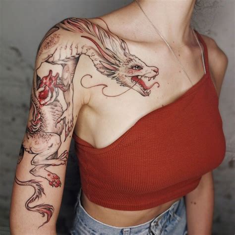 Pin by Angela Deville on Tattoo inspo in 2024 | Dragon tattoo for women, Tattoos, Stylish tattoo