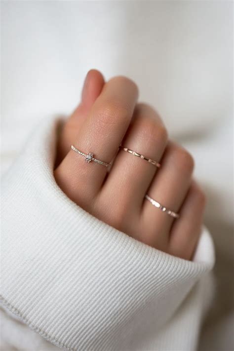 Picture Of minimalist rings with hammering and a diamond one for a ...