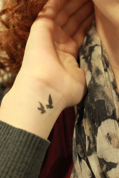 Drew these two bird silhouettes on my wrist. if i ever got a tattoo, i'd probably get this ...