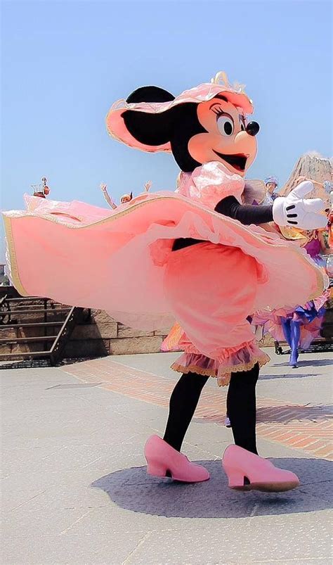 Minnie dancing away while she performs in a show at Tokyo Disney Sea ...