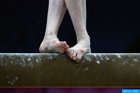 A study of gymnasts feet on the balance beam. | TIM CLAYTON PHOTOGRAPHY