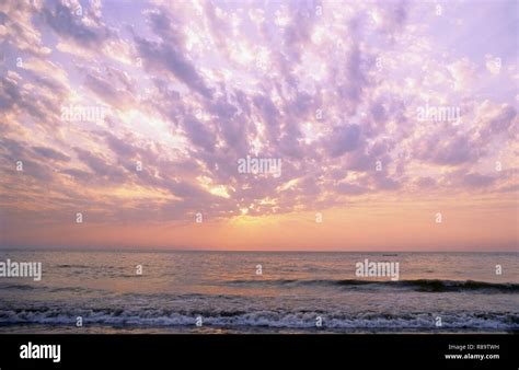 Cloudy Sunset, Juhu Beach, Mumbai, Maharashtra, India Stock Photo - Alamy