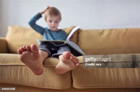 688 Barefoot Boy Reading Stock Photos, High-Res Pictures, and Images - Getty Images