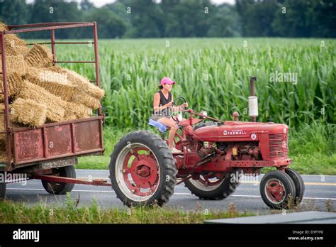 Woman driving tractor hi-res stock photography and images - Alamy