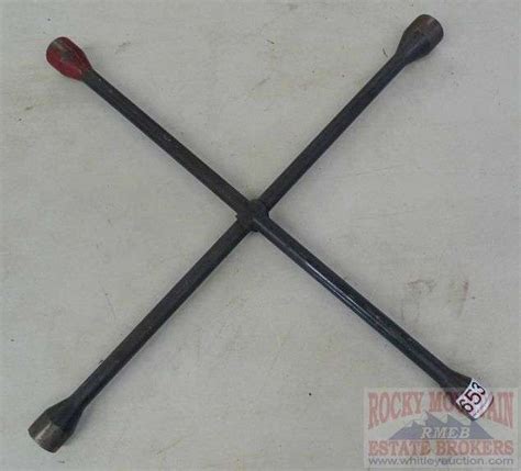 Craftsman 4-way lug wrench. - Rocky Mountain Estate Brokers Inc.