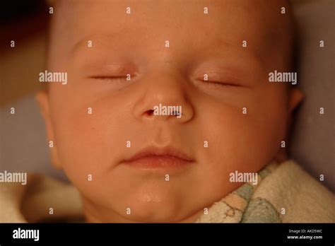 Baby Boy Sleeping MR Stock Photo - Alamy