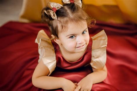 Portrait of Adorable Two Year Old Baby Girl in a Luxury Red Dress Posing for Camera Stock Image ...