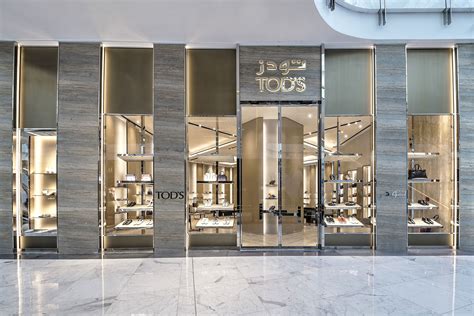 TOD'S Dubai Mall | Supermarket design, Shop interior design, Jewelry store interior