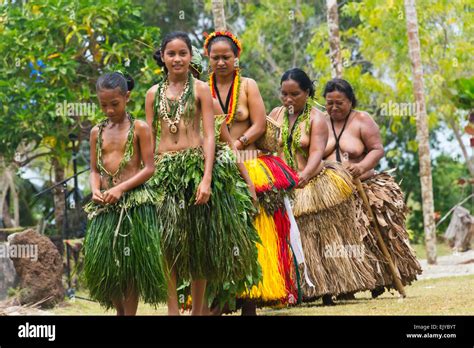 Yapese girls wearing different styles of grass skirts at Yap Day Festival, Yap Island, Federated ...