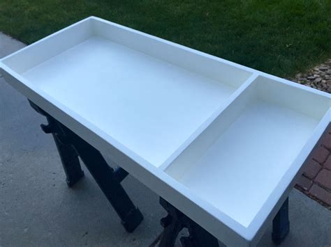 When you don't want to spend $150 on a Pottery Barn Changing Tray, what do you do? Build your ...