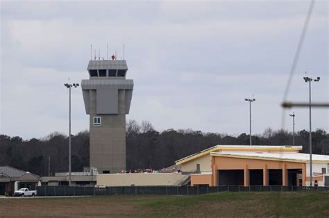 Cruise passengers arrive at Dobbins Air Reserve Base to begin quarantine as Georgia reacts to virus