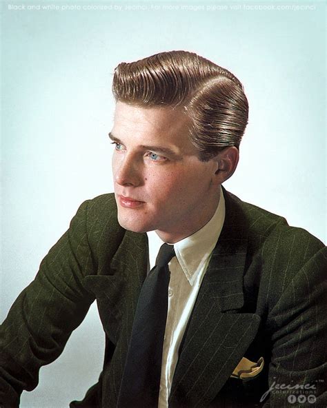 Young Roger Moore in an advertisement photograph for a hair product. Photograph by Zoltan Glass ...