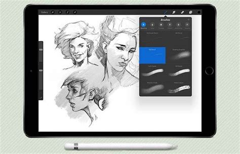 a tablet with some drawings on it and a pen in front of the ipad's screen