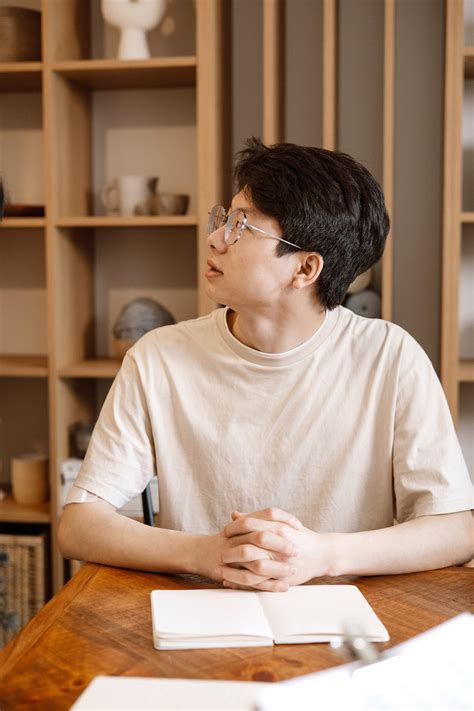 A Man using Laptop while Smiling · Free Stock Photo