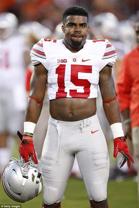 Ezekiel Elliott brings his trademark crop top look to the NFL Draft | Half shirts, Womens shirts ...