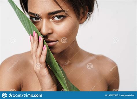 Image of Shirtless African American Woman Posing with Green Leaf Stock Image - Image of ...