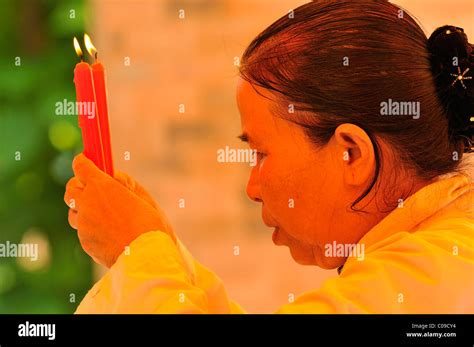 Praying woman, Vietnam, Southeast Asia Stock Photo - Alamy