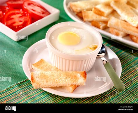 CODDLED EGG WITH TOAST Stock Photo - Alamy