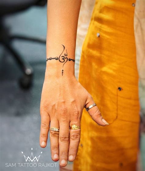 20+ Spiritual Om Tattoo Designs Ideas For Both Men and Women - Tikli Hindu Tattoos, New Tattoos ...