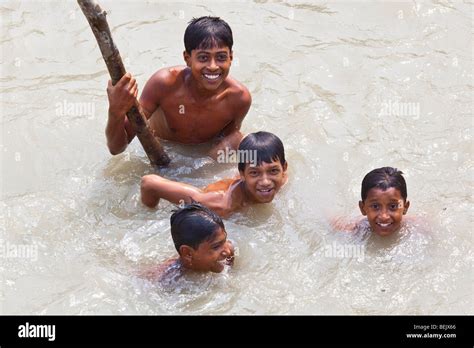 Seen from the Rocket: Boys swimming in the Brahmaputra River in Bangladesh Stock Photo - Alamy